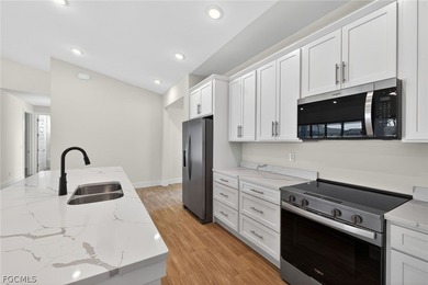 Live the Southwest Florida dream in this award-winning new on Palmetto-Pine Country Club in Florida - for sale on GolfHomes.com, golf home, golf lot