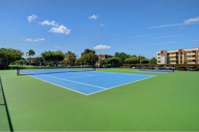 Welcome to this beautifully updated 2BR/2BA condo in the highly on Boca Dunes Golf and Country Club in Florida - for sale on GolfHomes.com, golf home, golf lot