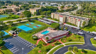 Welcome to this beautifully updated 2BR/2BA condo in the highly on Boca Dunes Golf and Country Club in Florida - for sale on GolfHomes.com, golf home, golf lot