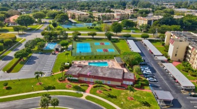 Welcome to this beautifully updated 2BR/2BA condo in the highly on Boca Dunes Golf and Country Club in Florida - for sale on GolfHomes.com, golf home, golf lot