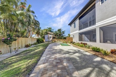 The Home is a beautiful Coastal Med style home constructed to on Bird Bay Executive Golf Club in Florida - for sale on GolfHomes.com, golf home, golf lot