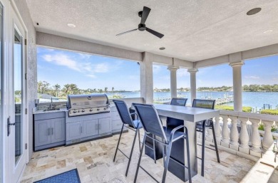 The Home is a beautiful Coastal Med style home constructed to on Bird Bay Executive Golf Club in Florida - for sale on GolfHomes.com, golf home, golf lot