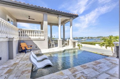 The Home is a beautiful Coastal Med style home constructed to on Bird Bay Executive Golf Club in Florida - for sale on GolfHomes.com, golf home, golf lot