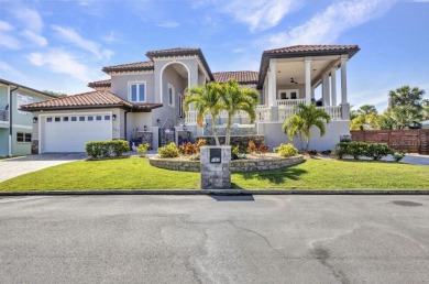 The Home is a beautiful Coastal Med style home constructed to on Bird Bay Executive Golf Club in Florida - for sale on GolfHomes.com, golf home, golf lot
