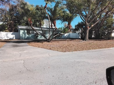 Located in the heart of Belleair, this charming two-bedroom and on Belleair Country Club in Florida - for sale on GolfHomes.com, golf home, golf lot