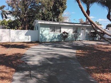 Located in the heart of Belleair, this charming two-bedroom and on Belleair Country Club in Florida - for sale on GolfHomes.com, golf home, golf lot