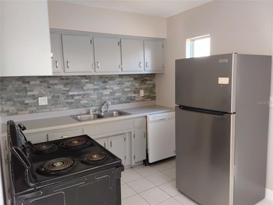 Located in the heart of Belleair, this charming two-bedroom and on Belleair Country Club in Florida - for sale on GolfHomes.com, golf home, golf lot