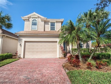 This 3/2.5 home is located on a corner lake lot with a beautiful on Crown Colony Golf and Country Club in Florida - for sale on GolfHomes.com, golf home, golf lot