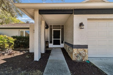 Drive down the winding, tree-lined streets of Fairway Springs to on Seven Springs Golf and Country Club in Florida - for sale on GolfHomes.com, golf home, golf lot