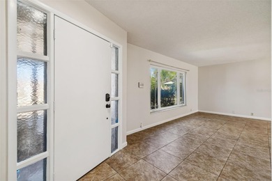 Drive down the winding, tree-lined streets of Fairway Springs to on Seven Springs Golf and Country Club in Florida - for sale on GolfHomes.com, golf home, golf lot