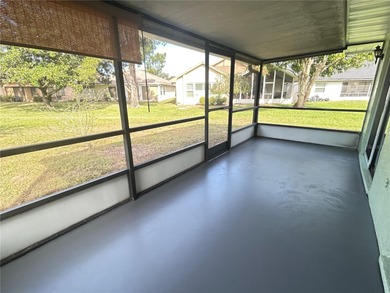 Enjoy the Florida country club lifestyle in this affordable and on Cypresswood Golf and Country Club in Florida - for sale on GolfHomes.com, golf home, golf lot