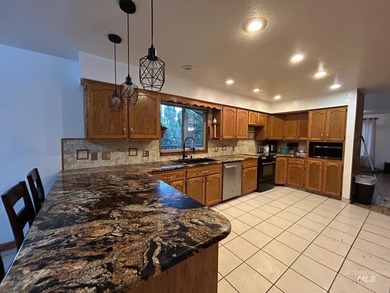 Gorgeous 4-bedroom, 3-bath home perfectly positioned on Lewiston on Lewiston Golf and Country Club in Idaho - for sale on GolfHomes.com, golf home, golf lot