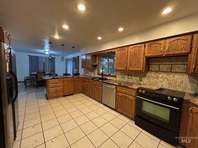 Gorgeous 4-bedroom, 3-bath home perfectly positioned on Lewiston on Lewiston Golf and Country Club in Idaho - for sale on GolfHomes.com, golf home, golf lot