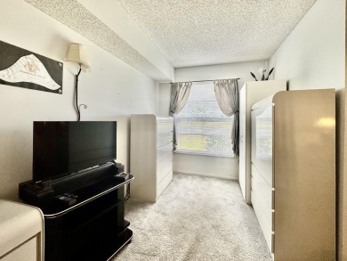Lovely first-floor 2 bed 2 bath well appointed condo in the on Marina Lakes Golf Course in Florida - for sale on GolfHomes.com, golf home, golf lot