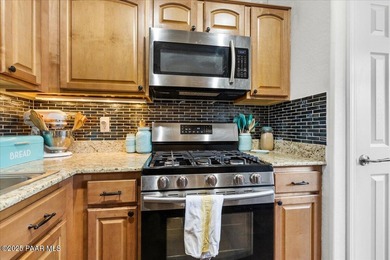 View this stunning, 1966 sq.ft. 4-bedroom, 3-bath residence in on StoneRidge Golf Course in Arizona - for sale on GolfHomes.com, golf home, golf lot