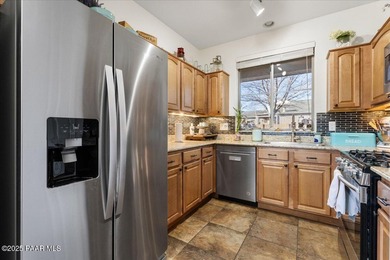 View this stunning, 1966 sq.ft. 4-bedroom, 3-bath residence in on StoneRidge Golf Course in Arizona - for sale on GolfHomes.com, golf home, golf lot