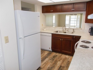Move in ready 2 bedroom, 2 bath condo/villa. Just updated with on Seven Springs Golf and Country Club in Florida - for sale on GolfHomes.com, golf home, golf lot