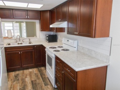 Move in ready 2 bedroom, 2 bath condo/villa. Just updated with on Seven Springs Golf and Country Club in Florida - for sale on GolfHomes.com, golf home, golf lot