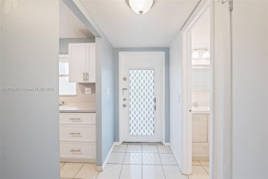 Welcome to this bright and spacious 1-bedroom, 1.5-bathroom on Sunrise Lakes Phase III in Florida - for sale on GolfHomes.com, golf home, golf lot