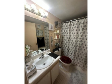 Welcome to this beautifully maintained 1 bed / 1 bath home on Flamingo Lakes Country Club in Florida - for sale on GolfHomes.com, golf home, golf lot