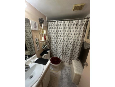 Welcome to this beautifully maintained 1 bed / 1 bath home on Flamingo Lakes Country Club in Florida - for sale on GolfHomes.com, golf home, golf lot