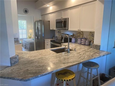 Pelican Landing - Impeccable 2 bed plus den with day bed, 2 bath on Pelicans Nest Golf Club in Florida - for sale on GolfHomes.com, golf home, golf lot