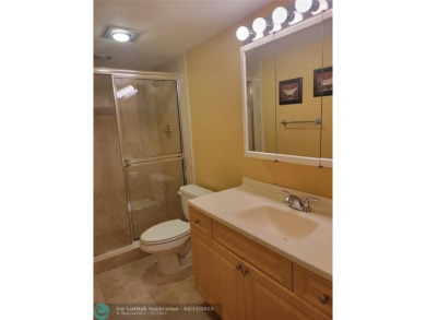 ELEGANT, IMMACULATE AND SPACIOUS UNIT WITH SERENE VIEWS OF GOLF on Wynmoor Golf Course in Florida - for sale on GolfHomes.com, golf home, golf lot