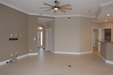 This 3 bedroom, 2 bath, ground level Mediterranean Style Villa on Twin Isles Country Club in Florida - for sale on GolfHomes.com, golf home, golf lot