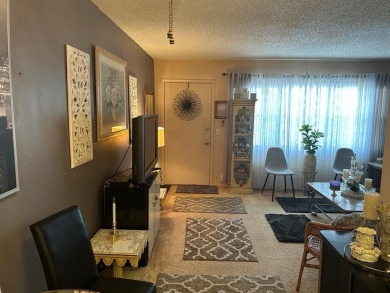 Welcome to this beautifully maintained 1 bed / 1 bath home on Flamingo Lakes Country Club in Florida - for sale on GolfHomes.com, golf home, golf lot