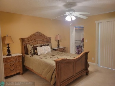 ELEGANT, IMMACULATE AND SPACIOUS UNIT WITH SERENE VIEWS OF GOLF on Wynmoor Golf Course in Florida - for sale on GolfHomes.com, golf home, golf lot