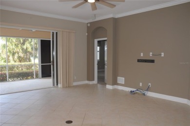 This 3 bedroom, 2 bath, ground level Mediterranean Style Villa on Twin Isles Country Club in Florida - for sale on GolfHomes.com, golf home, golf lot