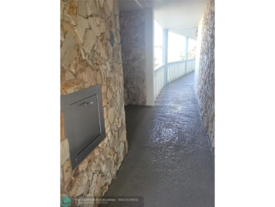 ELEGANT, IMMACULATE AND SPACIOUS UNIT WITH SERENE VIEWS OF GOLF on Wynmoor Golf Course in Florida - for sale on GolfHomes.com, golf home, golf lot