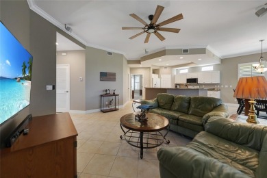 This 3 bedroom, 2 bath, ground level Mediterranean Style Villa on Twin Isles Country Club in Florida - for sale on GolfHomes.com, golf home, golf lot