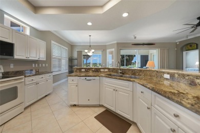 This 3 bedroom, 2 bath, ground level Mediterranean Style Villa on Twin Isles Country Club in Florida - for sale on GolfHomes.com, golf home, golf lot