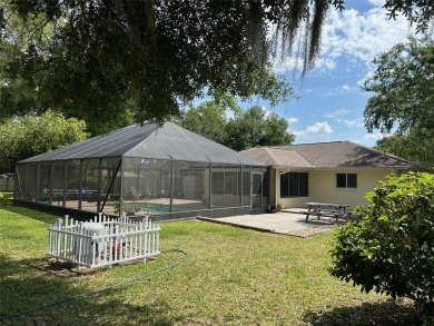 Florida living at its best and no HOA FEES! As you walk up to on Rainbows End Golf Club in Florida - for sale on GolfHomes.com, golf home, golf lot