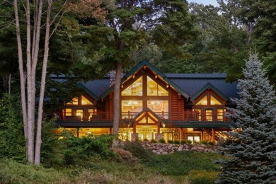 Welcome to this stunning Up North luxury log home perfectly on Boyne Mountain Resort - Monument Course in Michigan - for sale on GolfHomes.com, golf home, golf lot