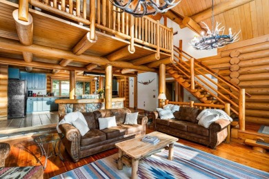 Welcome to this stunning Up North luxury log home perfectly on Boyne Mountain Resort - Monument Course in Michigan - for sale on GolfHomes.com, golf home, golf lot