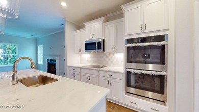 New Construction nestled along the fourth green at Pinehurst No on Pinehurst  No. 6 Golf Course in North Carolina - for sale on GolfHomes.com, golf home, golf lot