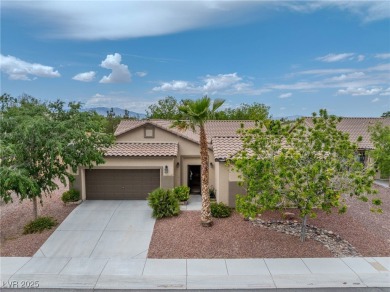 Stunning home with casita, gated courtyard, and lush on Mountain Falls Golf Course in Nevada - for sale on GolfHomes.com, golf home, golf lot