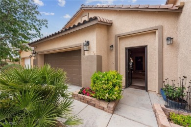 Stunning home with casita, gated courtyard, and lush on Mountain Falls Golf Course in Nevada - for sale on GolfHomes.com, golf home, golf lot