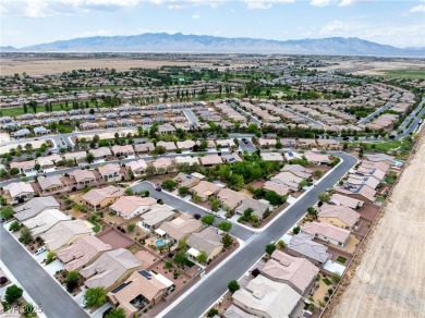 Stunning home with casita, gated courtyard, and lush on Mountain Falls Golf Course in Nevada - for sale on GolfHomes.com, golf home, golf lot