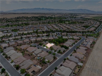 Stunning home with casita, gated courtyard, and lush on Mountain Falls Golf Course in Nevada - for sale on GolfHomes.com, golf home, golf lot