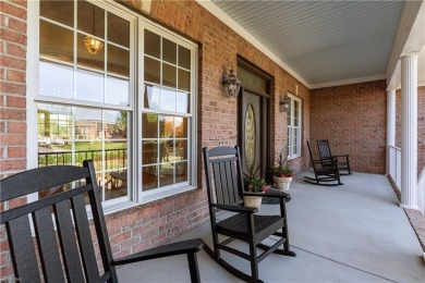 Experience breathtaking sunsets over the 7th hole of Heron Ridge on Heron Ridge Golf Club in Virginia - for sale on GolfHomes.com, golf home, golf lot