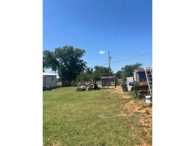Nice and Open 3 bedroom 2 bath Manufactured home. Large backyard on Mountain Creek Golf Club in Texas - for sale on GolfHomes.com, golf home, golf lot