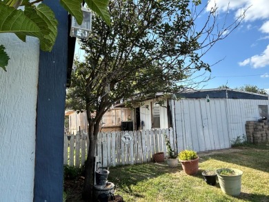 Nice and Open 3 bedroom 2 bath Manufactured home. Large backyard on Mountain Creek Golf Club in Texas - for sale on GolfHomes.com, golf home, golf lot