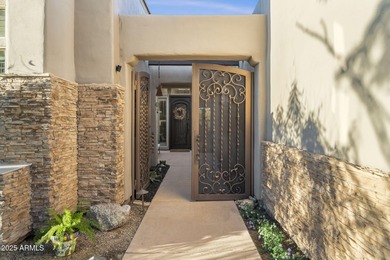 Experience refined indoor-outdoor living in this beautifully on Troon North Golf Club  in Arizona - for sale on GolfHomes.com, golf home, golf lot