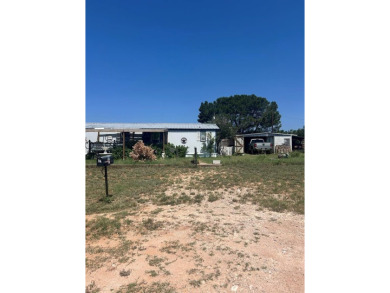 Nice and Open 3 bedroom 2 bath Manufactured home. Large backyard on Mountain Creek Golf Club in Texas - for sale on GolfHomes.com, golf home, golf lot
