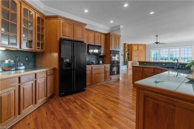 Experience breathtaking sunsets over the 7th hole of Heron Ridge on Heron Ridge Golf Club in Virginia - for sale on GolfHomes.com, golf home, golf lot