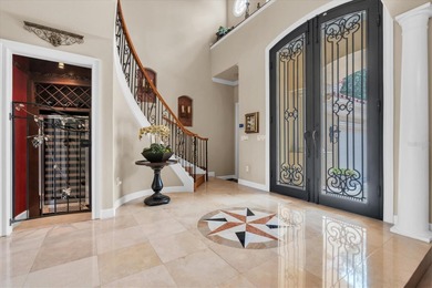 Welcome to this exquisite custom-built estate home perfectly on Wentworth Golf Club in Florida - for sale on GolfHomes.com, golf home, golf lot