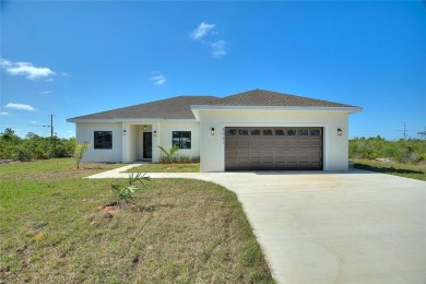 STUNNING NEW CONSTRUCTION HOME in Indian Lake Estates - Golf on Indian Lake Estates Golf and Country Club in Florida - for sale on GolfHomes.com, golf home, golf lot